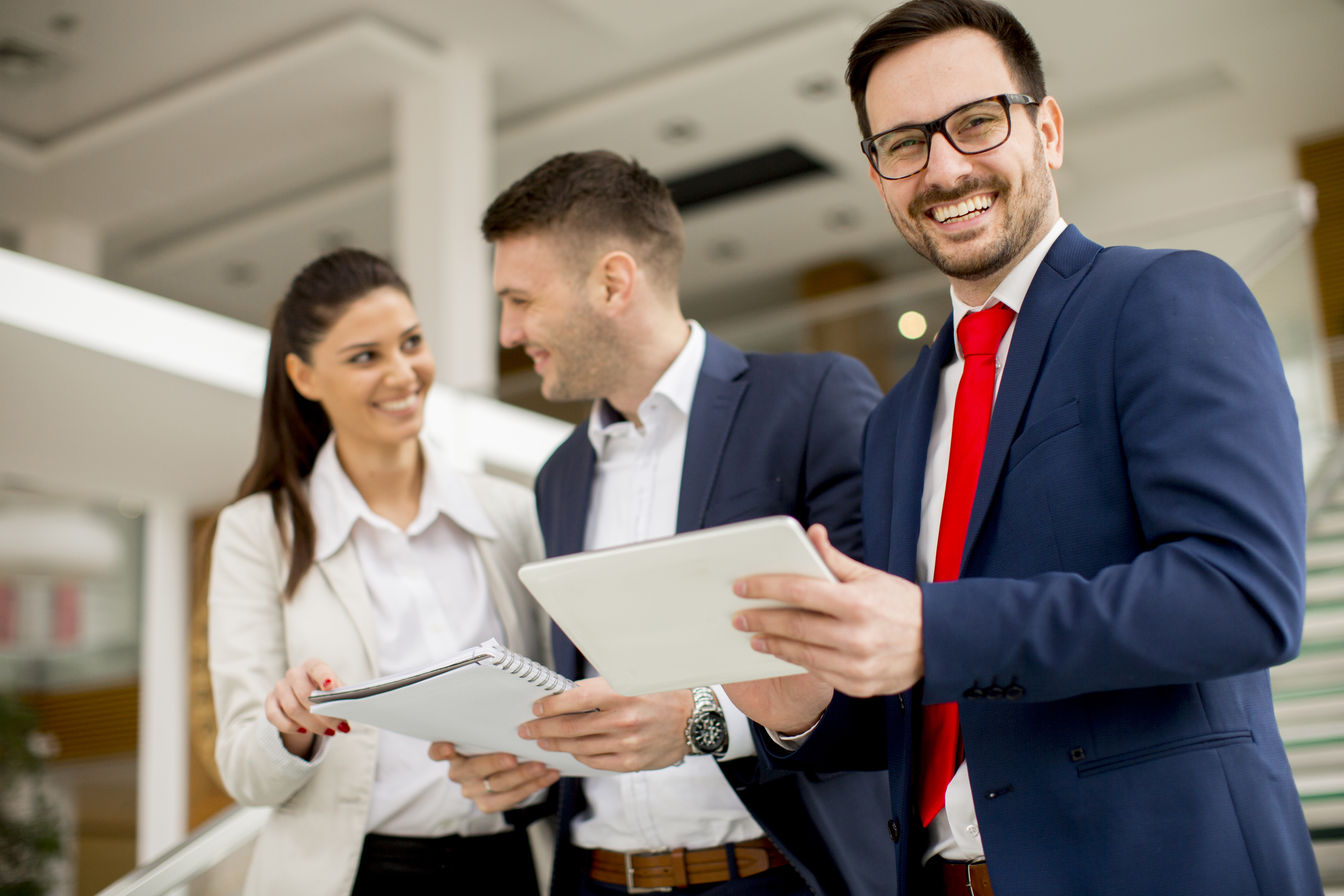 Young business people standing in the office