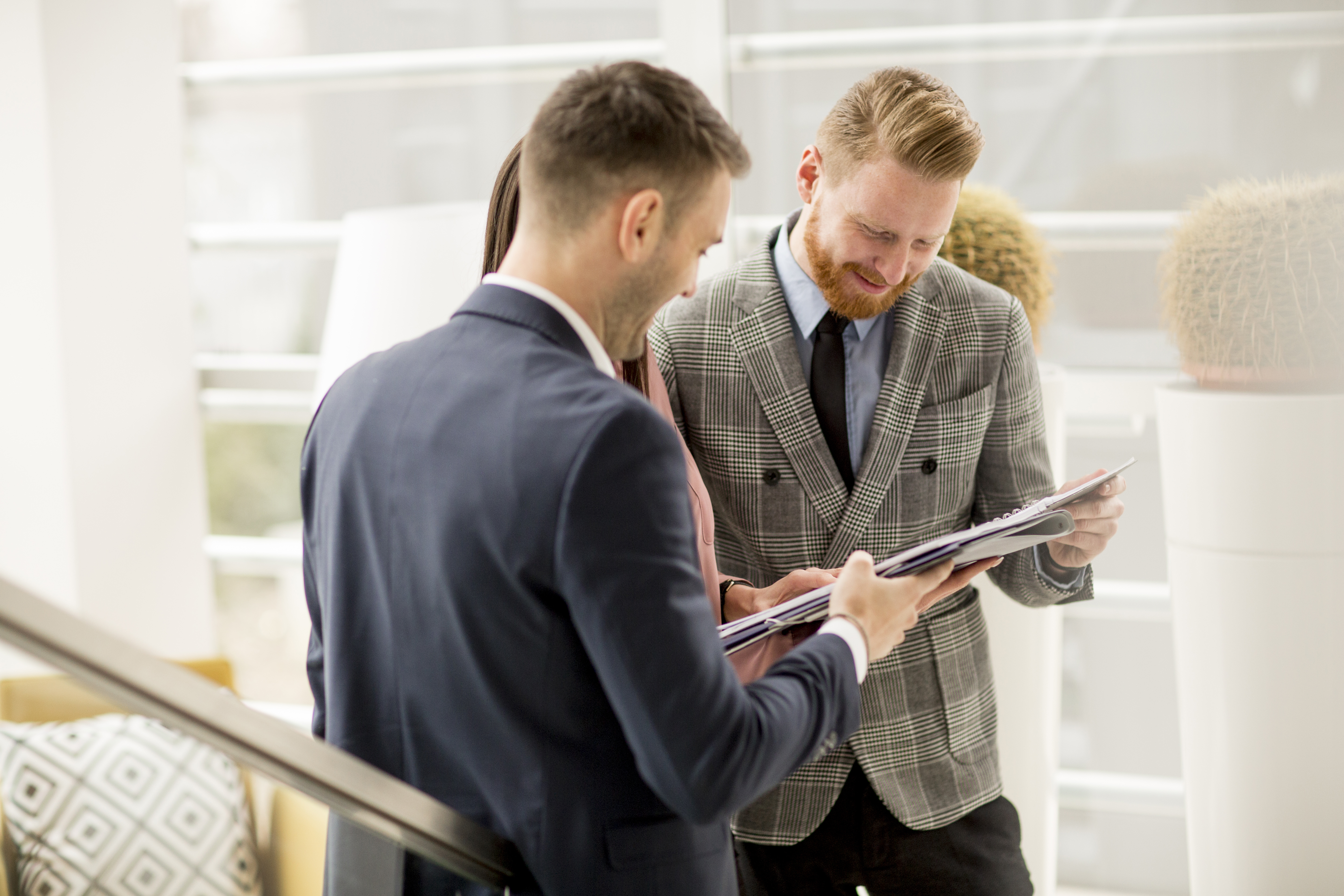 Young business people standing in the office